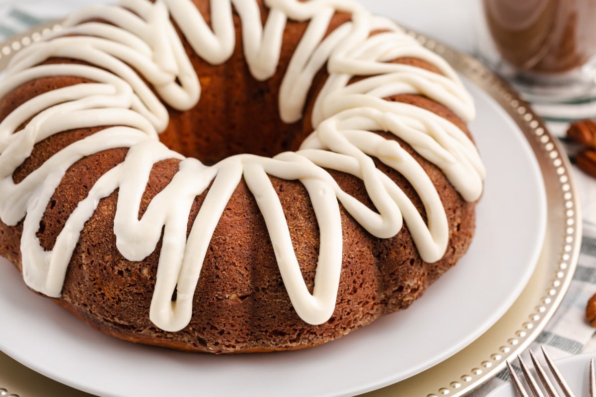 a bundt cake with a thick white glaze drizzled on top