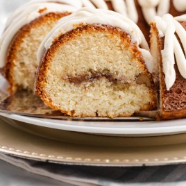 a slice of yogurt streusel coffee cake on a spatula