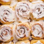 overhead shot of lightly frosted cinnamon rolls