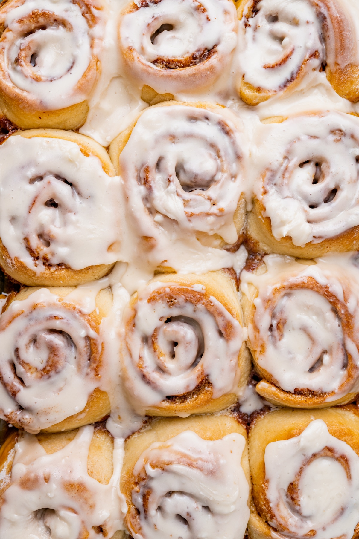 overhead shot of lightly frosted cinnamon rolls