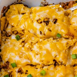 closeup of melted cheese on easy enchilada casserole