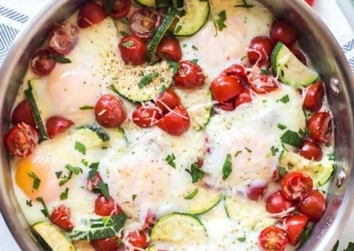 overhead view of eggs in a skillet