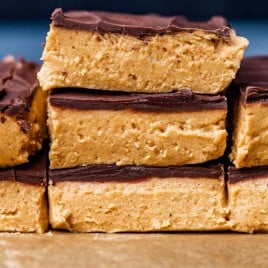closeup of peanut butter squares with chocolate on top