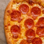 overhead shot of a homemade pepperoni pizza