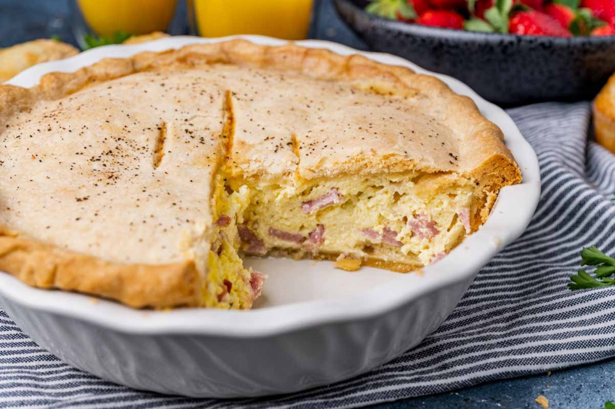 double crust easter ham pie in a white pie plate
