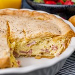 italian easter pie with ham and ricotta on a table