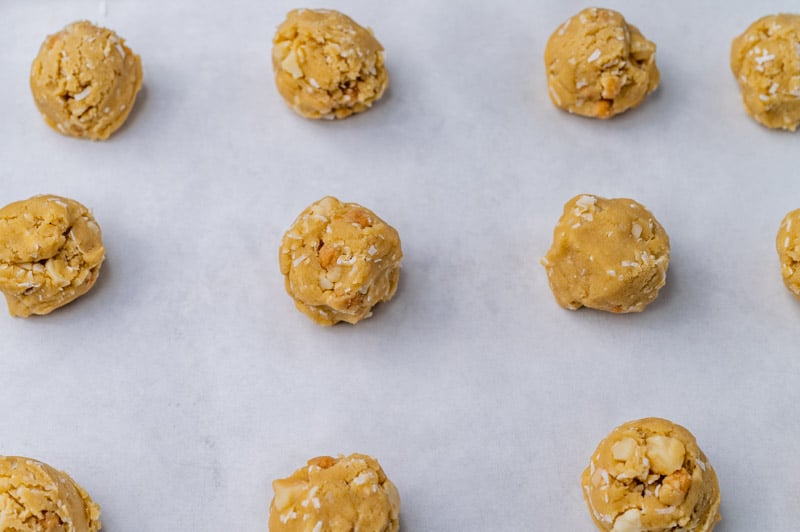 unbaked cookie dough on a baking sheet