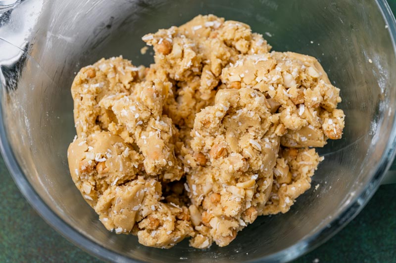 caramel coconut macadamia nut cookie dough in a bowl