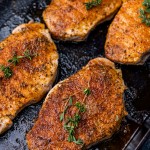 oven baked pork chops in a skillet