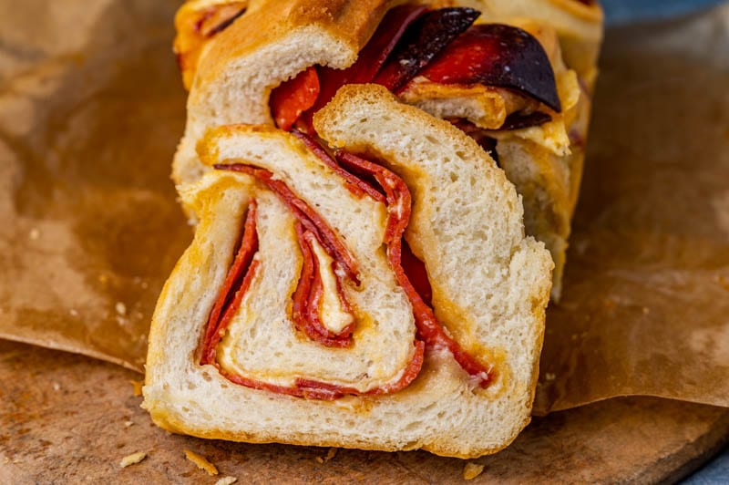 sliced pizza babka on parchment paper