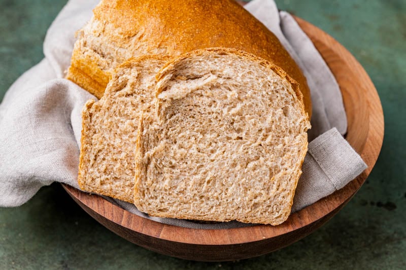 slices of honey wheat bread with sourdough discard