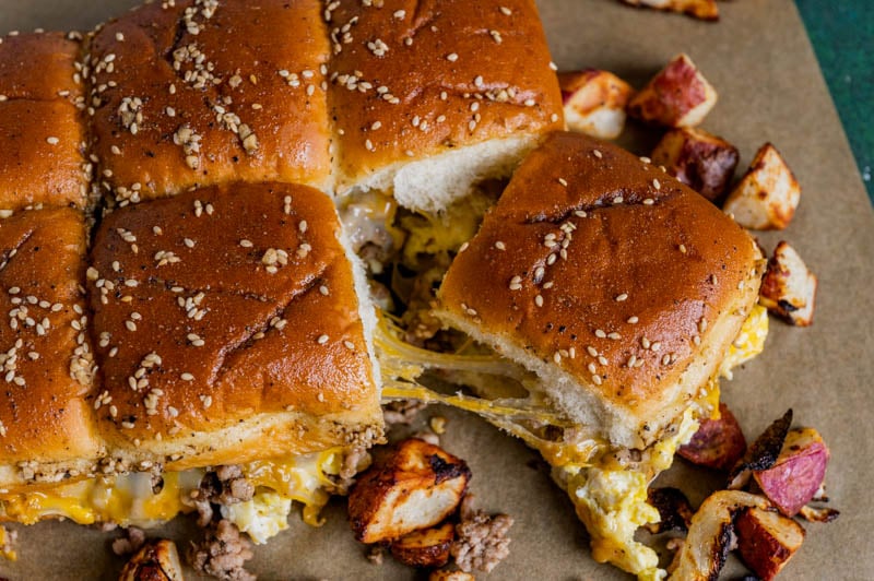 overhead view of breakfast sliders on parchment paper