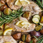 chicken, potatoes and zucchini on a sheet pan