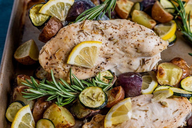 lemon chicken with rosemary on a pan