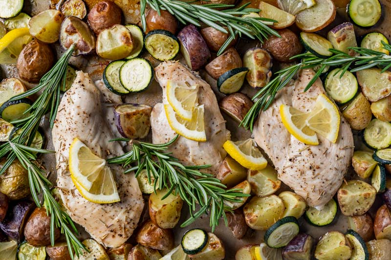 lemon chicken sheet pan dinner with fresh rosemary