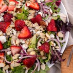 overhead view of strawberry salad on a plate
