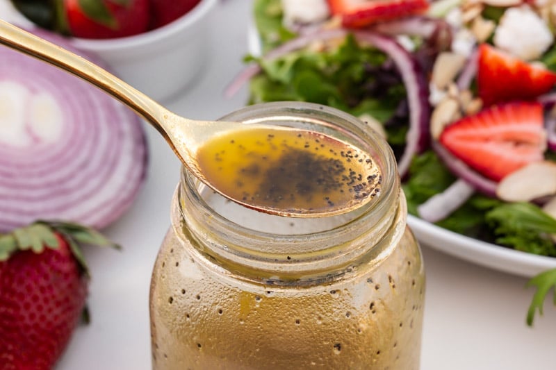 poppy seed dressing on a spoon