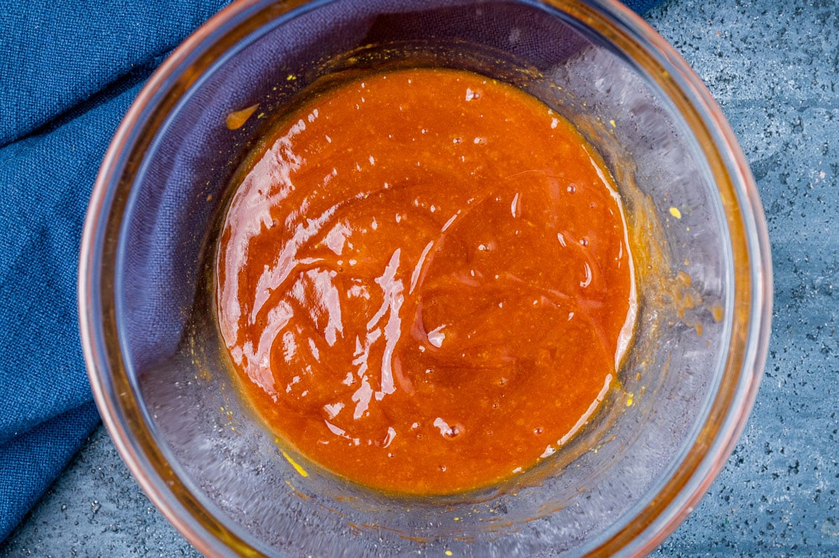 sauce for calico beans in a glass bowl