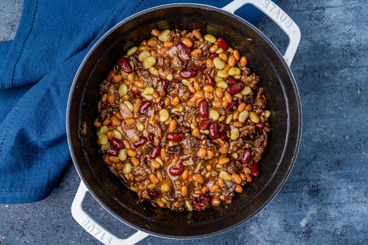 uncooked calico beans in a baking dish