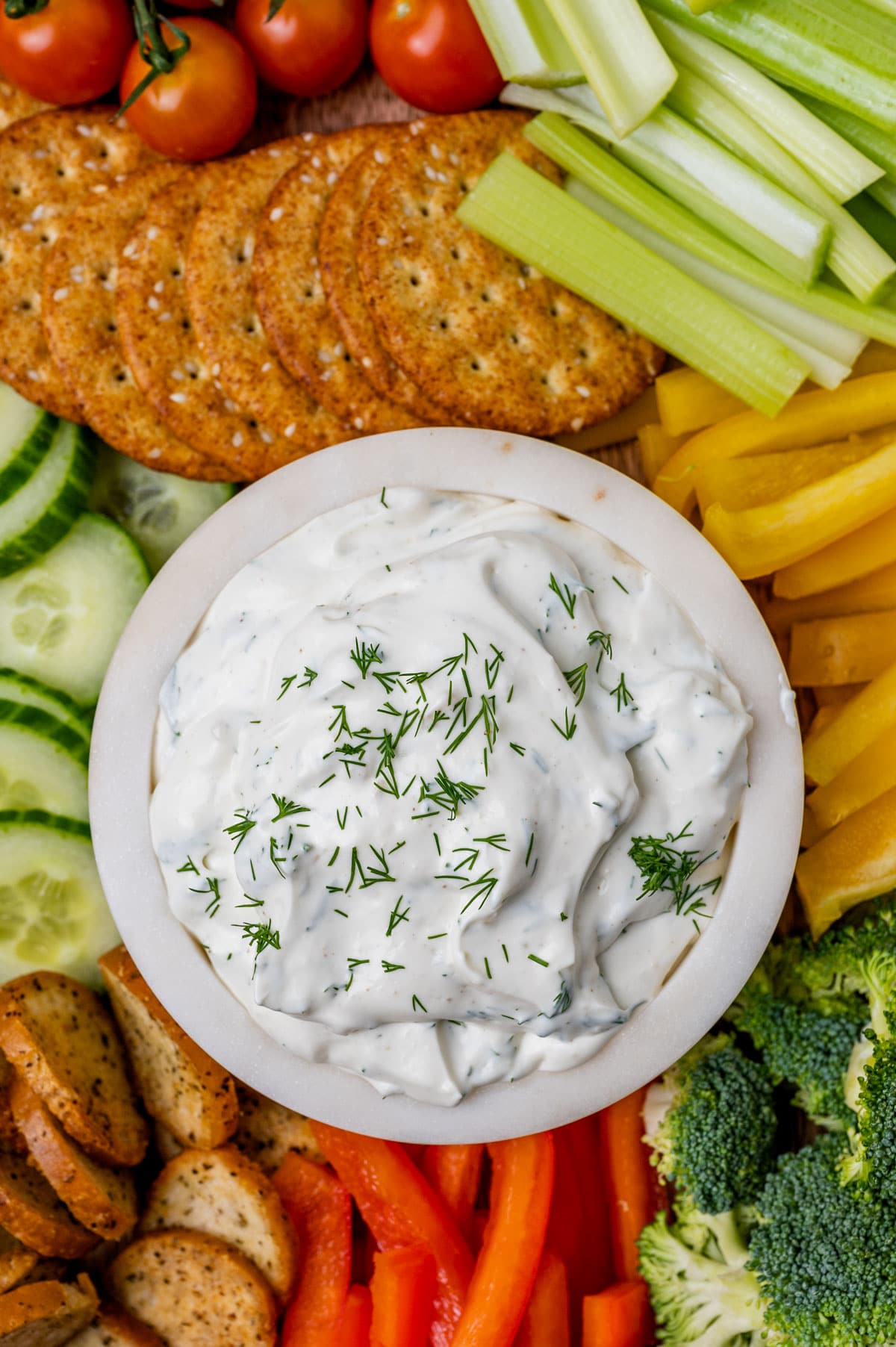 charcuterie board with creamy dill dip