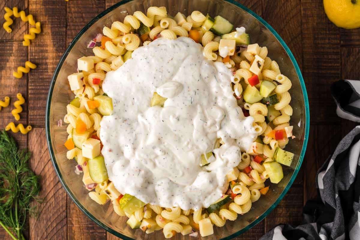 white sauce over pasta salad