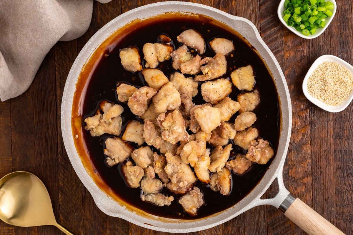 fried chicken in sauce in a pan