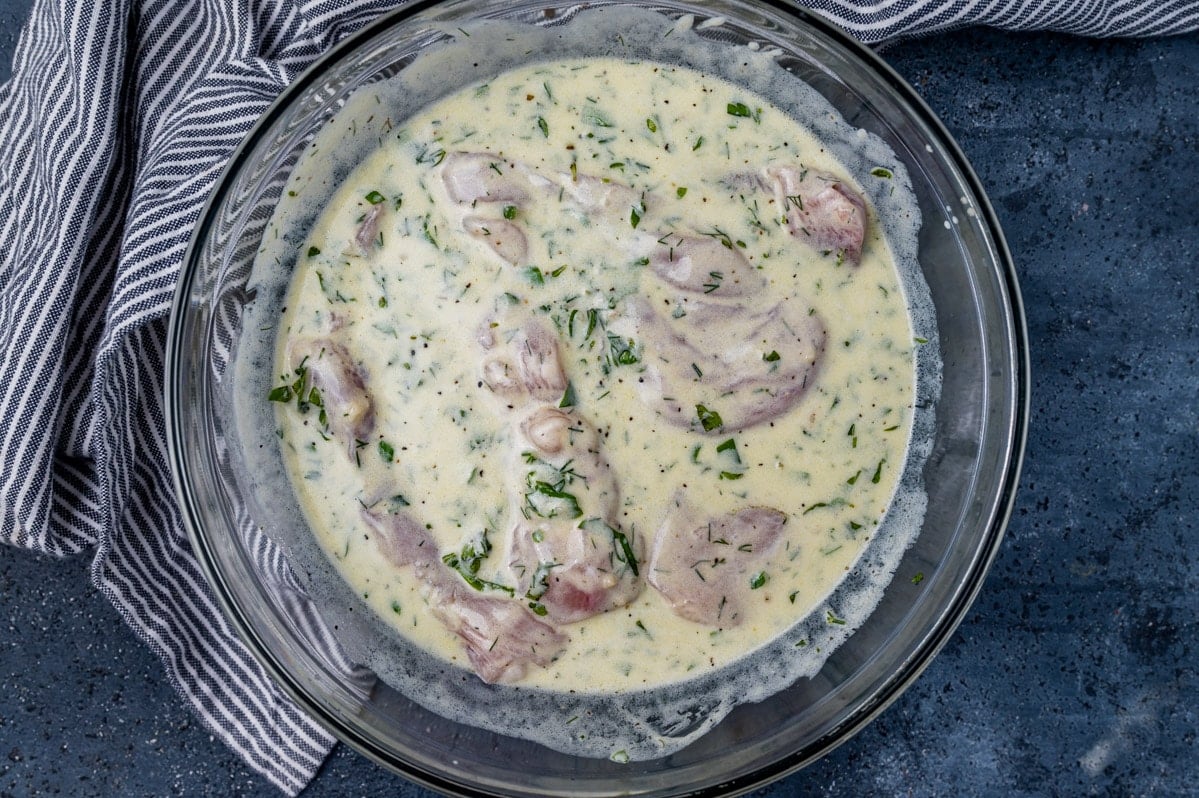 chicken in greek marinade in a bowl