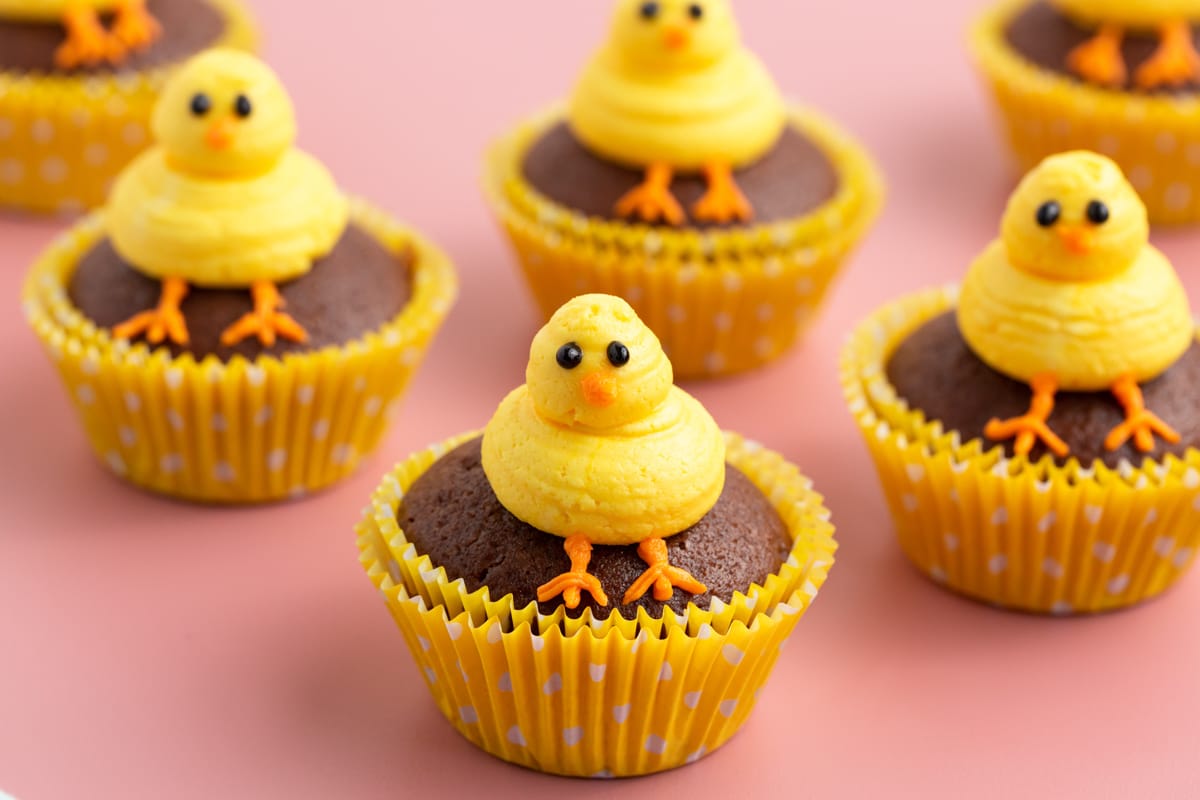 easter chick cupcakes on a table