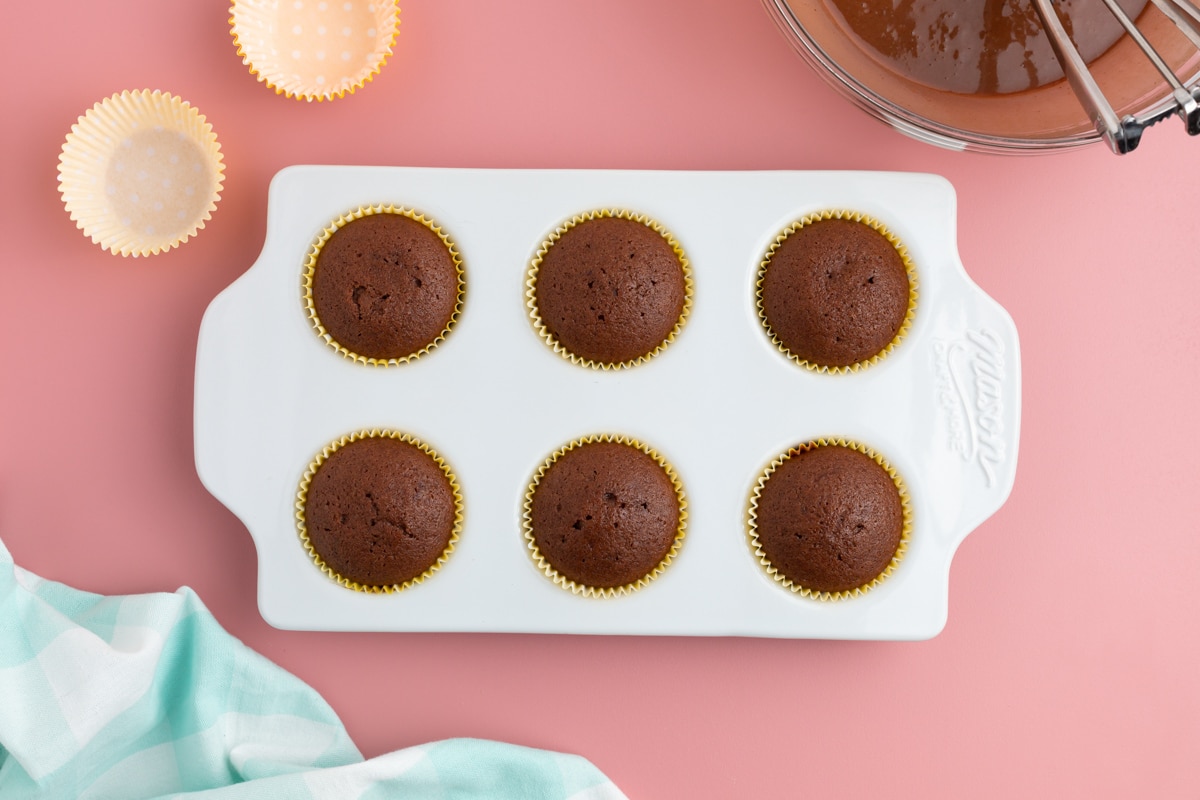 baked chocolate cupcakes in a muffin pan