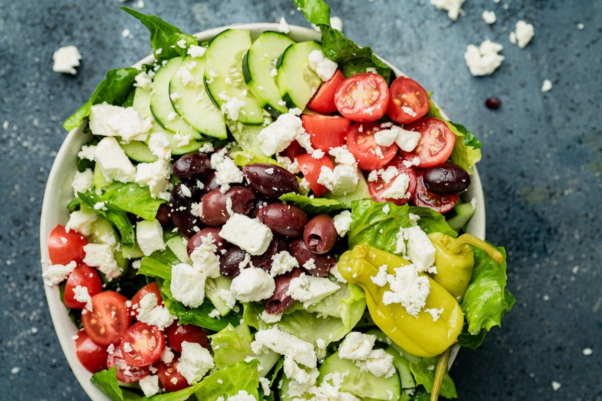salad with Greek toppings in a bowl