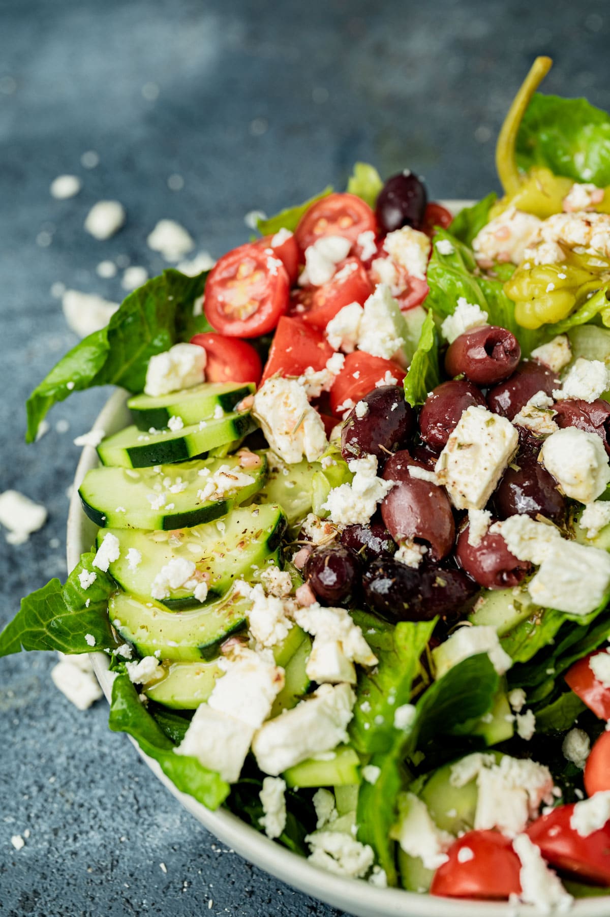 large bowl of Greek salad with cucumber, olives, tomato, feta