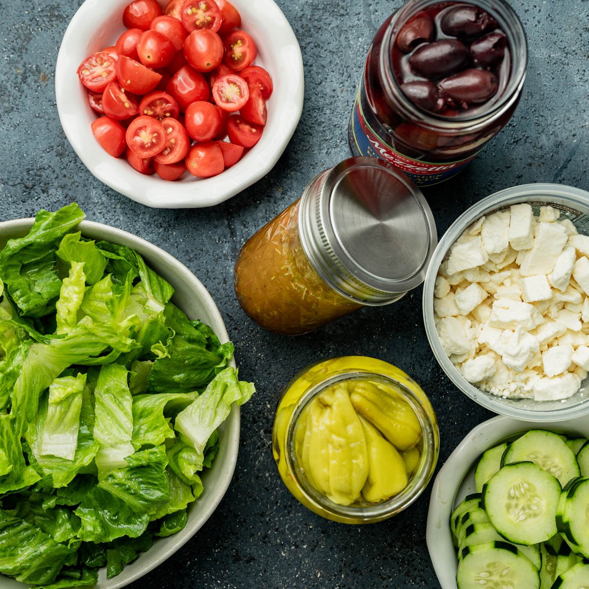 ingredients for Greek salad on a table