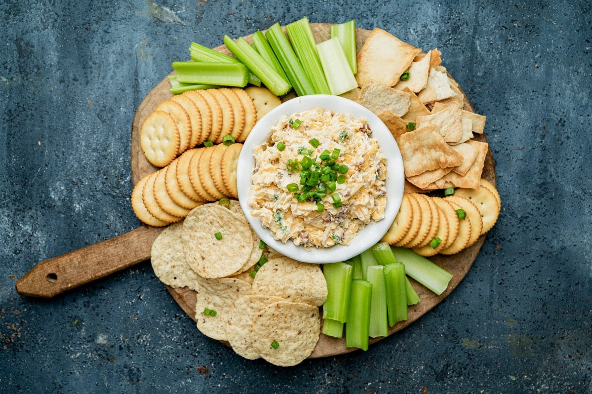 overhead view of a charcuterie board with million dollar dip