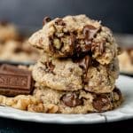 a stack of three cookies with one broken open