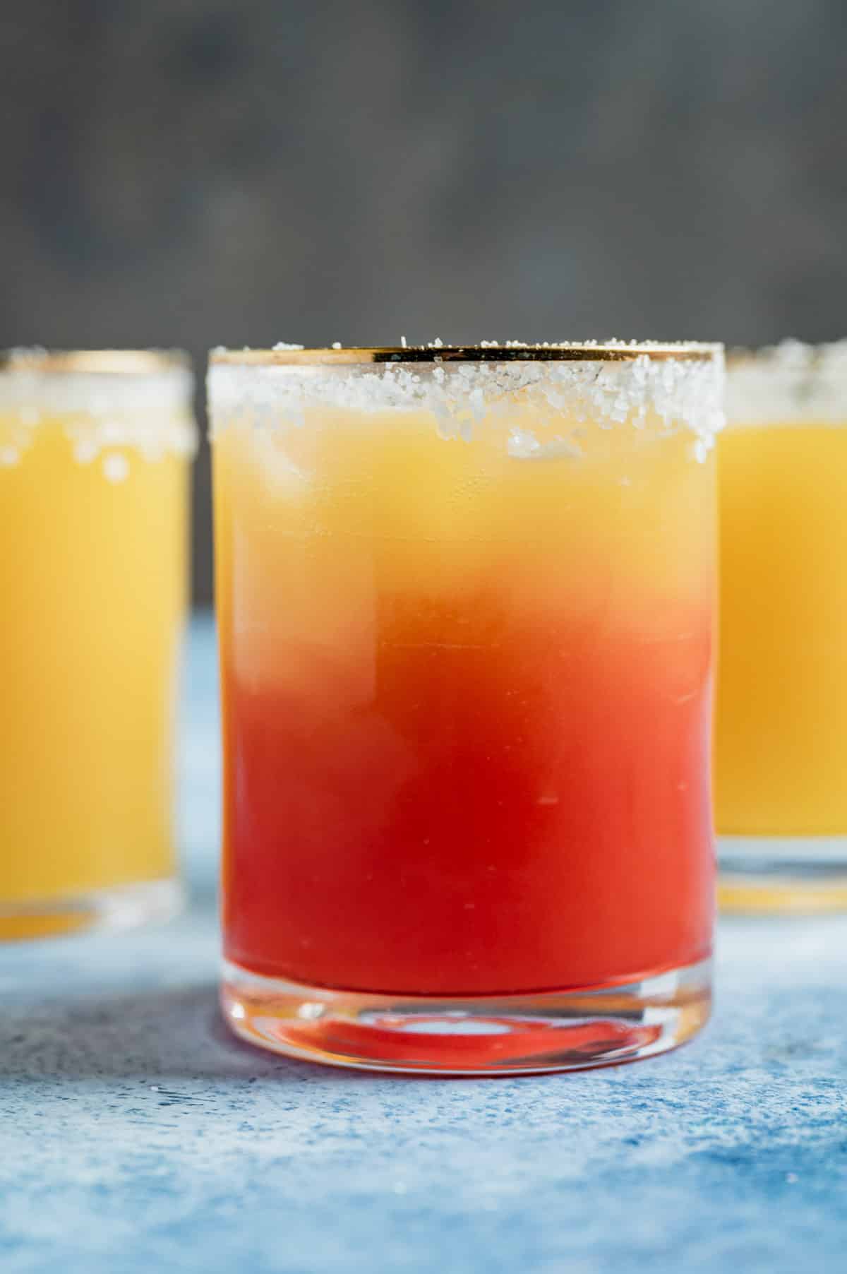 peach sunrise mocktail in a glass