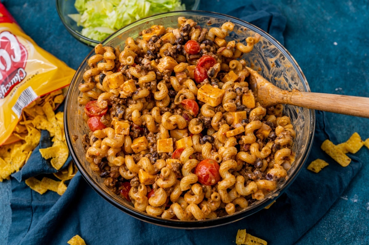 pasta salad in a bowl with a spoon