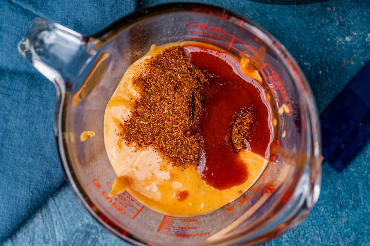 taco salad sauce in a mixing cup