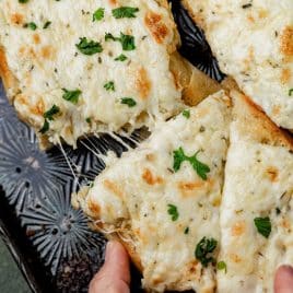an overhead view of cheesy garlic bread