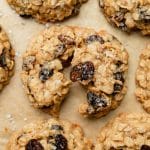 overhead view of a cinnamon raisin oatmeal cookie broken in half