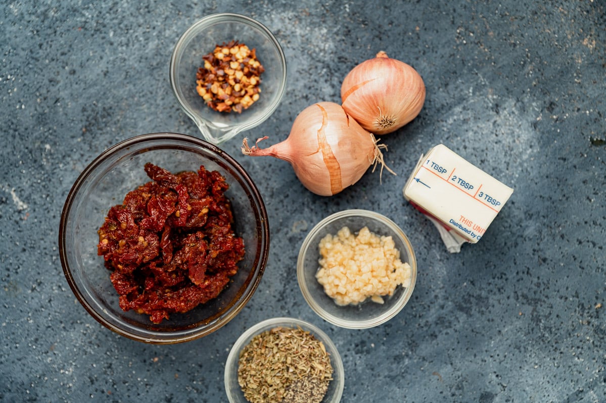ingredients for pasta sauce on a table