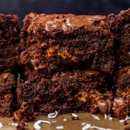 closeup of two fudgy brownies stacked on each other