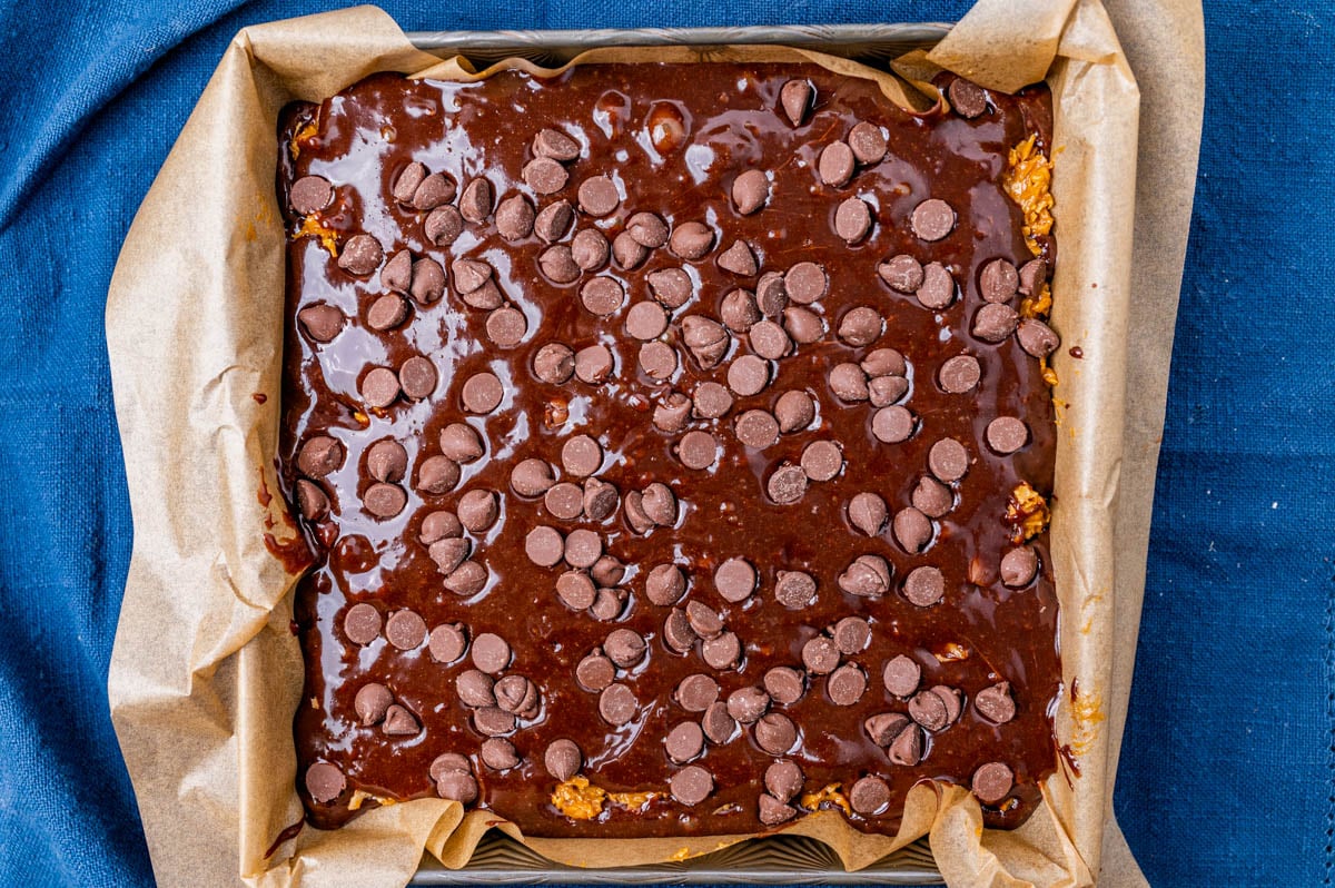 unbaked brownies in a pan