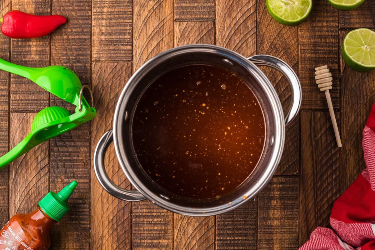 view of honey sriracha sauce in a saucepan