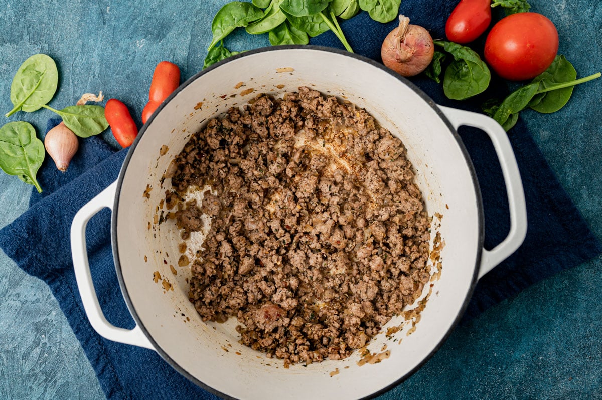 ground pork browned in a skillet