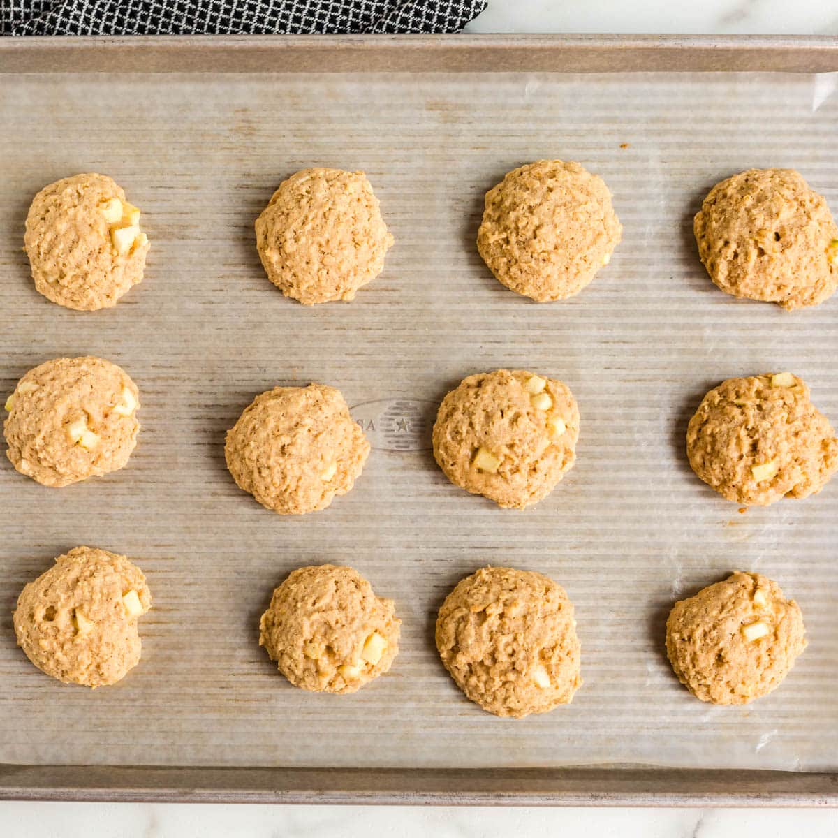 baked apple cookies on a pan