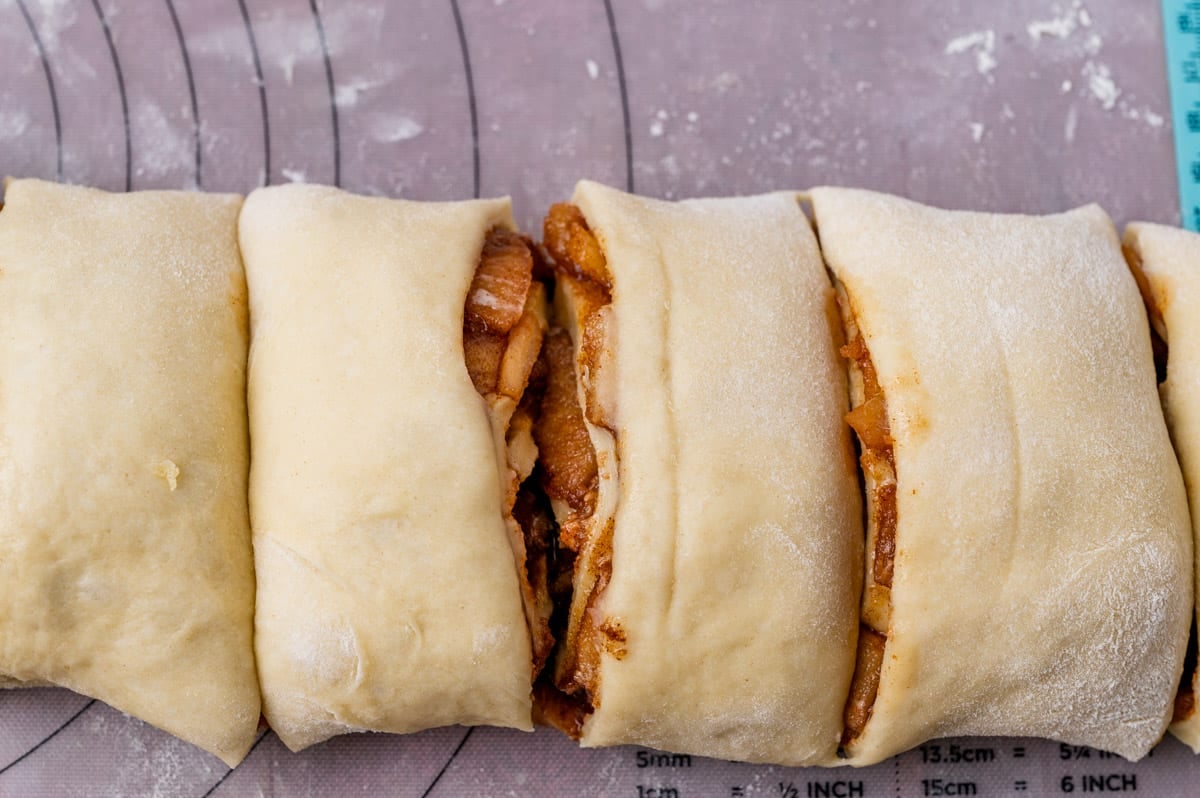 sliced apple cinnamon rolls on a table