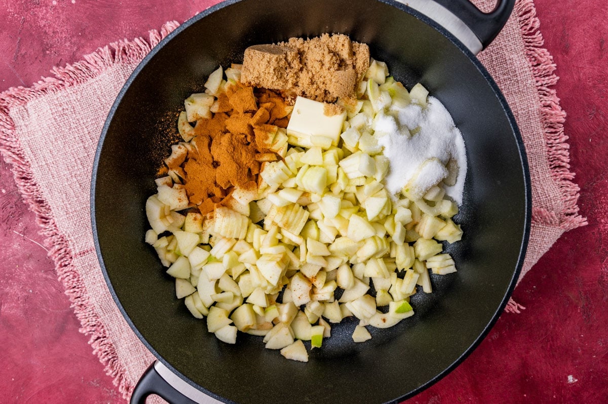 apples, butter, cinnamon and sugar in a skillet