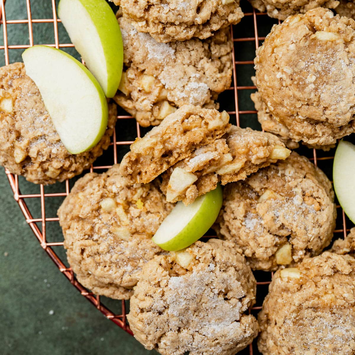 apple oatmeal cookies on a wire rack with apple slices