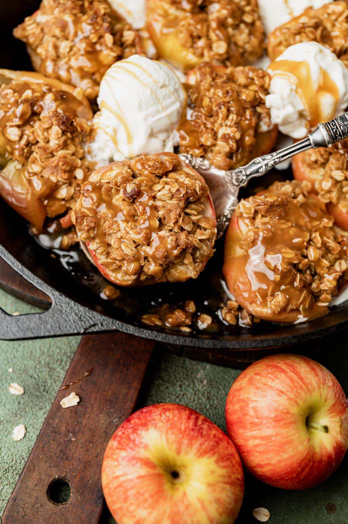 skillet of baked apples with crumble on top