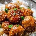 a plate of teriyaki turkey meatballs with rice